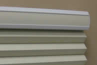 white headrail with color coordinated insert